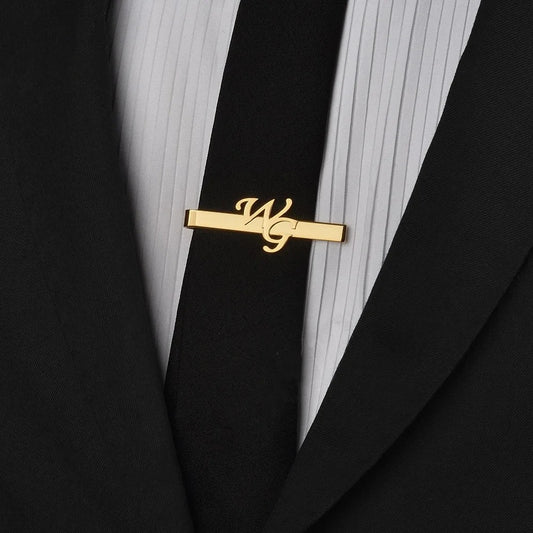 Personalized tie clip with engraved initial, close-up