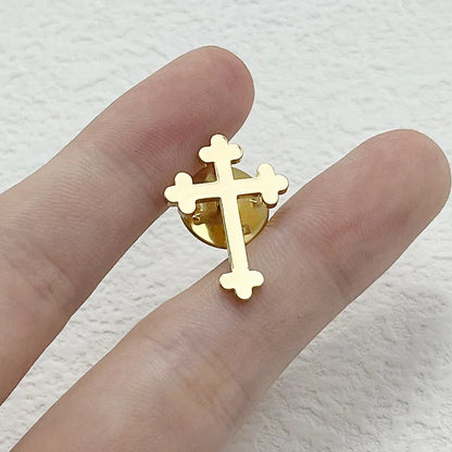 Stainless steel cross brooch close up detail