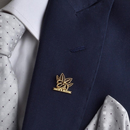 Corporate logo brooch pin on white shirt collar